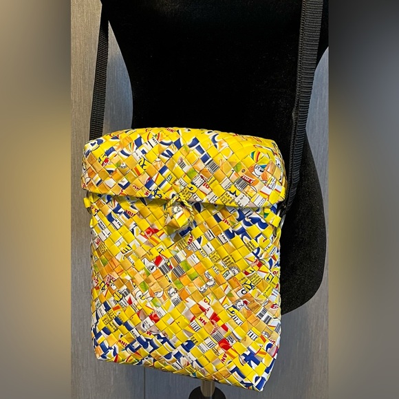 Rebagz Handbags - Re*Bagz Half the Sky Recycled Juice Container Woven Crossbody Bag